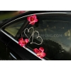 Décoration de voiture mariage orchidées rose foncé et le cœur