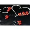 Décoration orchidées rouges et coeurs blancs voiture mariage