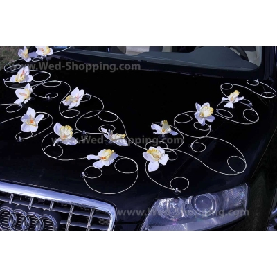 Décoration voiture mariage orchidées blanches